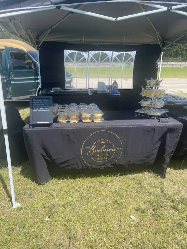 Bowlicious Eats desserts displayed at an event location